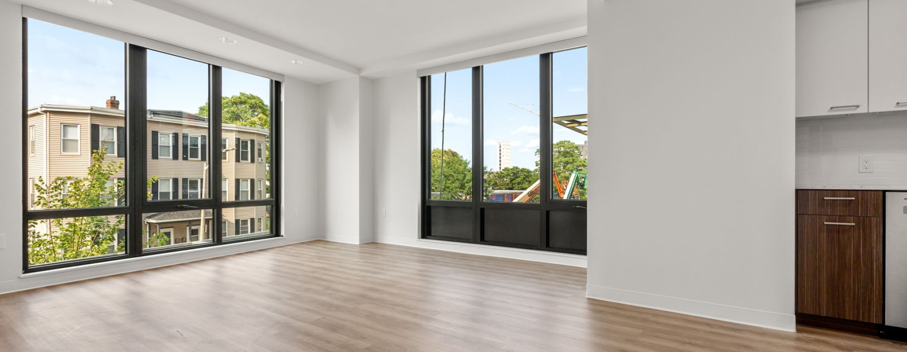 a living room with large windows