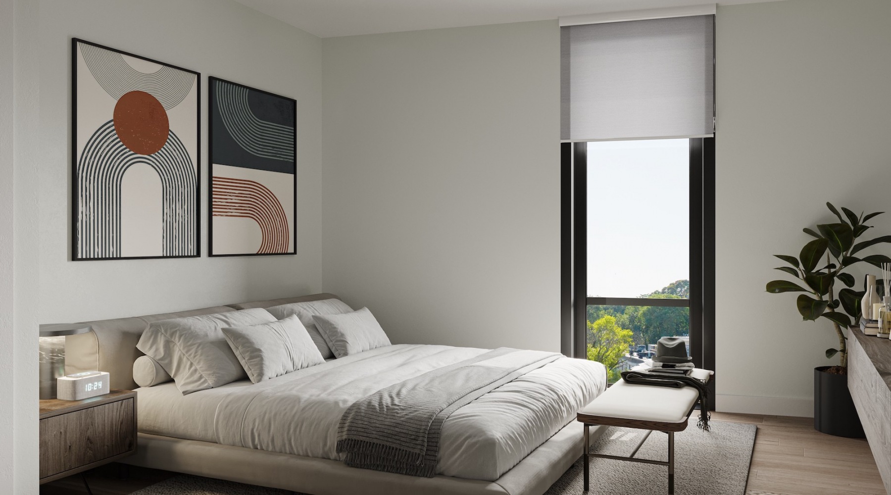 Bedroom with with end table and large widow 